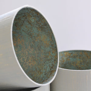 Silver-grey dupion silk with Cole & Son "Salvage" wallpaper