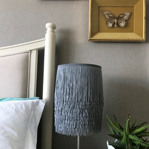 Silver grey tassel lampshade with Cole & Son liner