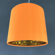 Load image into Gallery viewer, Tangerine silk lampshade with mirror gold liner