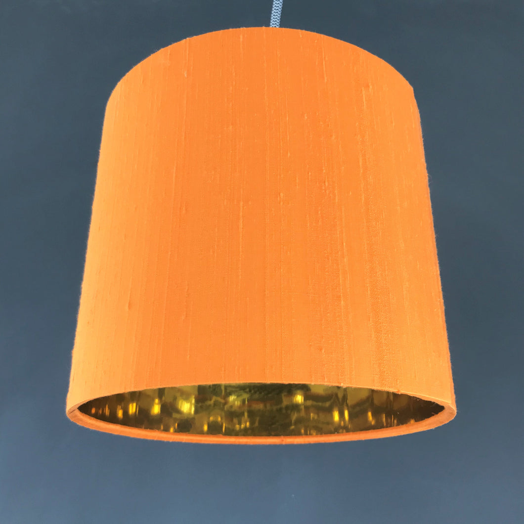 Tangerine silk lampshade with mirror gold liner
