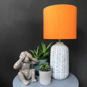 Tangerine silk lampshade with mirror gold liner