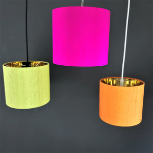 Tangerine silk lampshade with mirror gold liner